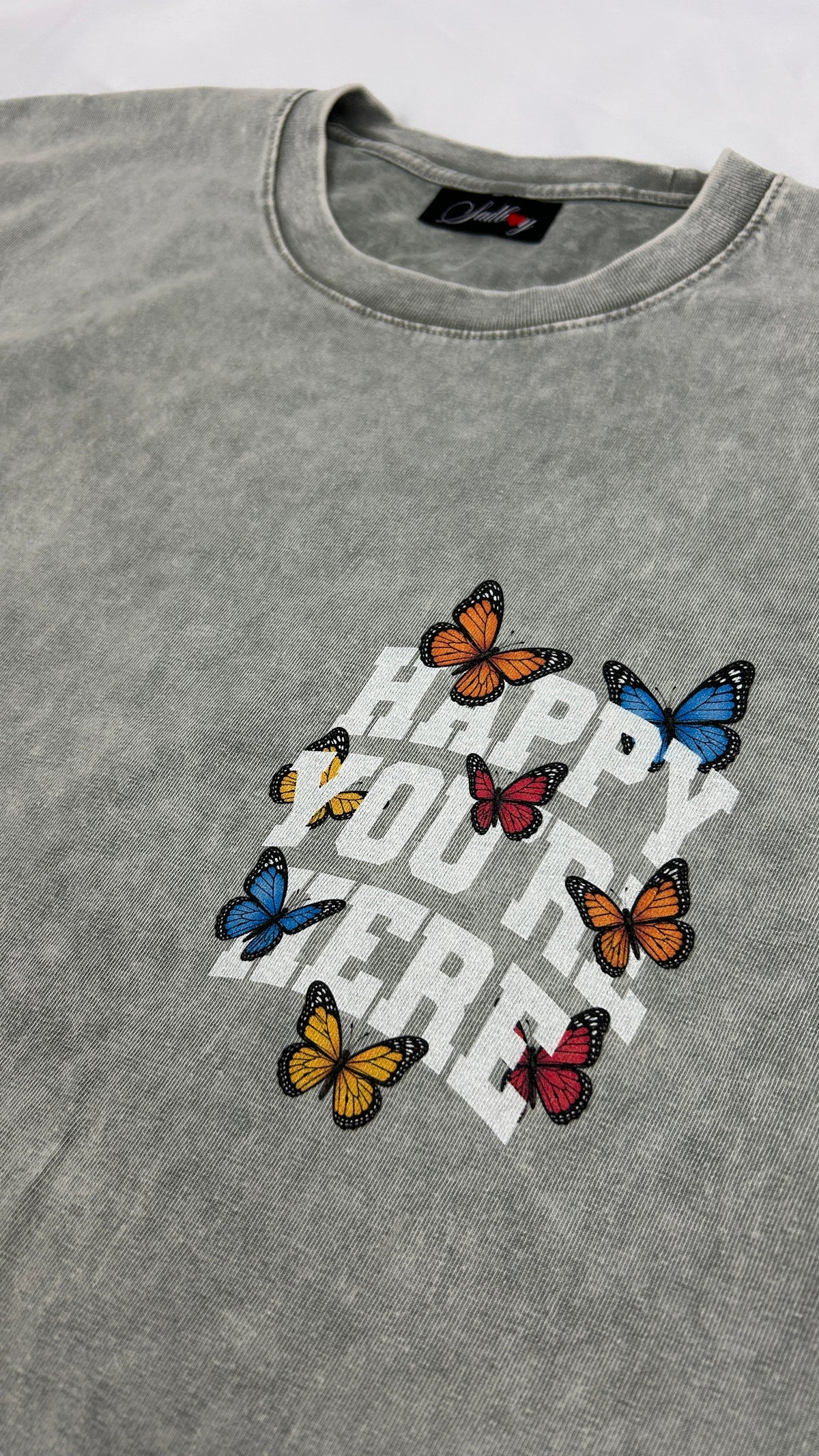 'HAPPY YOU'RE HERE' SHORT SLEEVE TEE